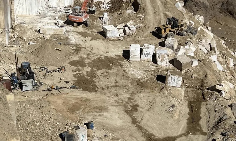 Diamond wire saw cutting stone at quarry