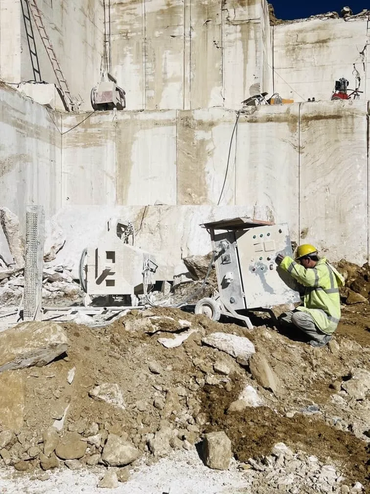 Diamond wire saw cutting stone at quarry