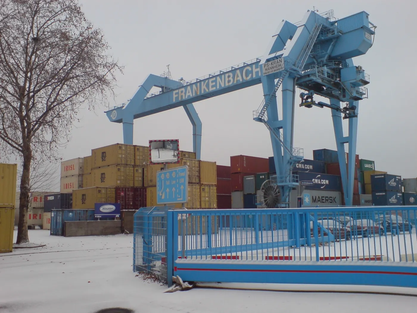 Shipping containers stacked at a port, representative of global export logistics
